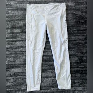 Lululemon white leggings with pockets and back zipper pocket. s12